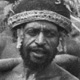 Two men carrying bundles of pearl shells for moka – Hagen, Papua New Guinea, 1964 - (© P.J. Stewart & A.J. Strathern Archive)