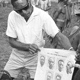 Official shows posters to electors - Dei Council, Hagen, PNG, 1968 - (© P.J. Stewart & A.J. Strathern Archive)